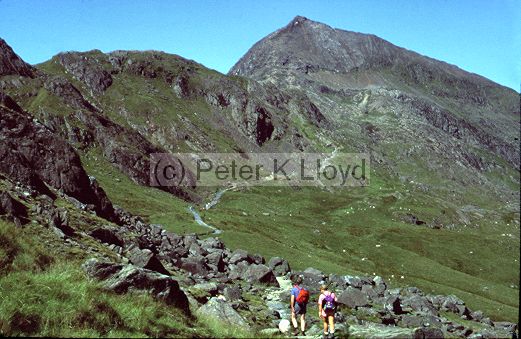 Walkers in Wales on Pyg track to Snowdon (in background)